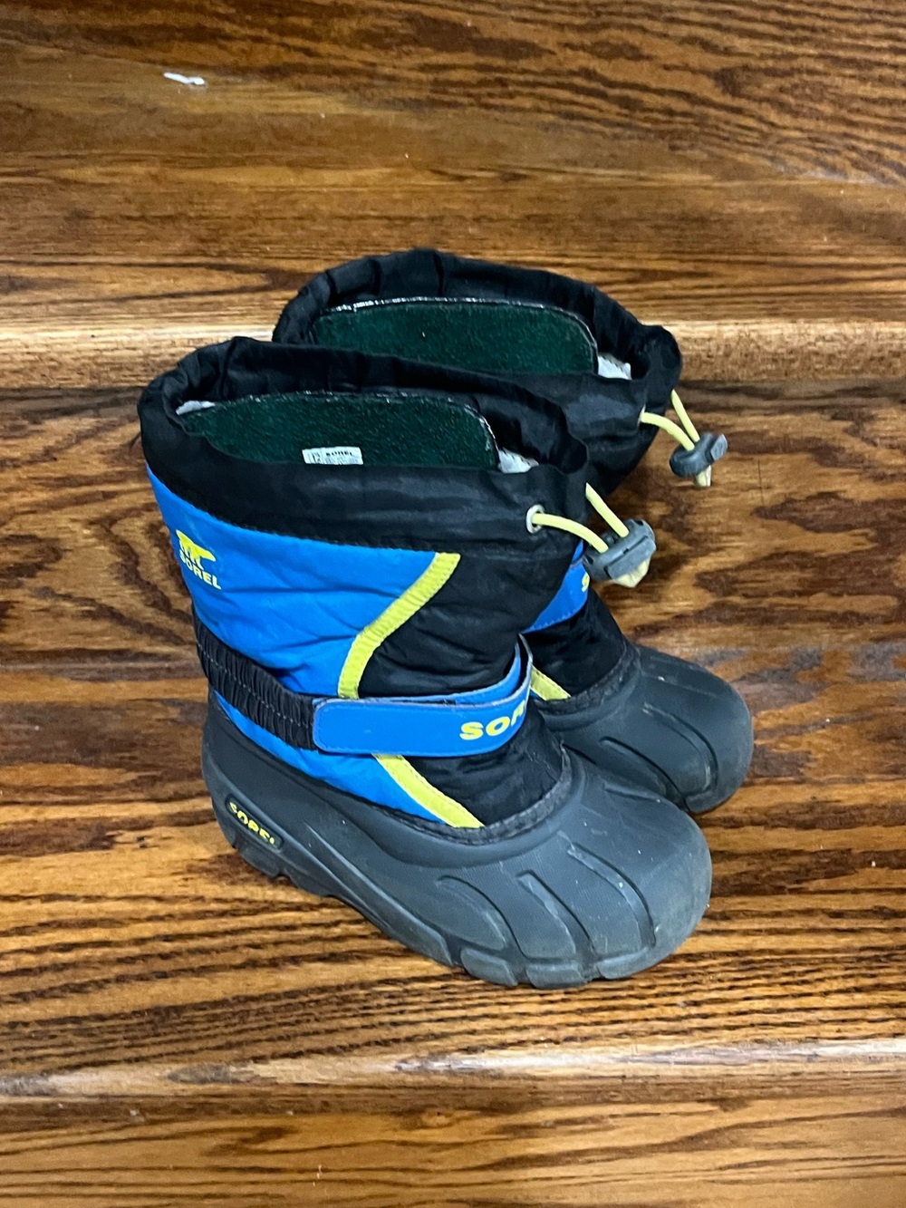 Sorel Kids Blue and Black Snow Boots with Yellow Accents